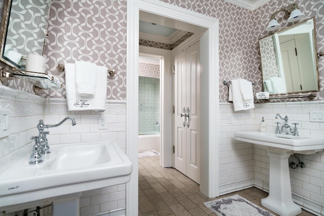 bathroom with sink and crown molding