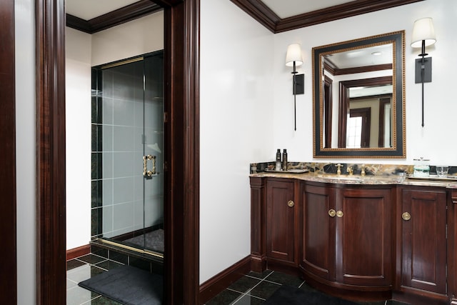 bathroom featuring tile patterned floors, crown molding, vanity, and walk in shower