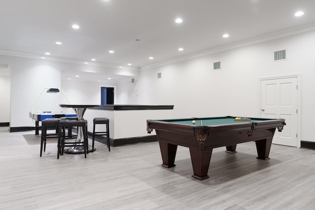 playroom with light hardwood / wood-style flooring, ornamental molding, and pool table