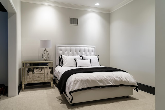 carpeted bedroom featuring ornamental molding