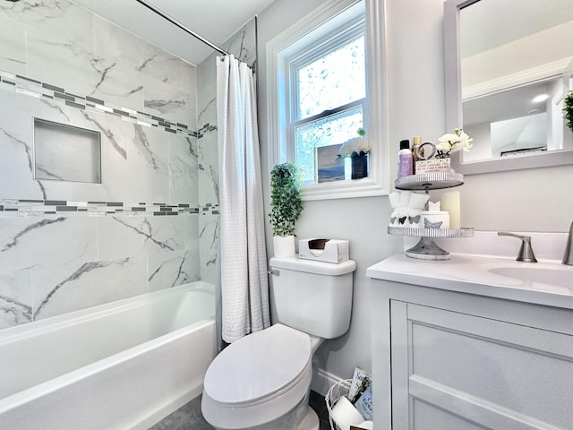 full bathroom featuring toilet, vanity, and shower / tub combo with curtain