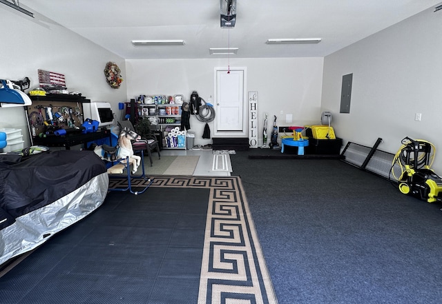 garage with electric panel and a garage door opener