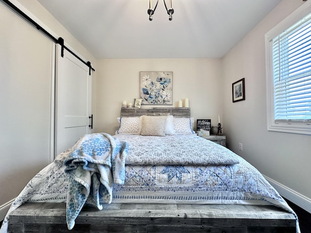 bedroom with a barn door