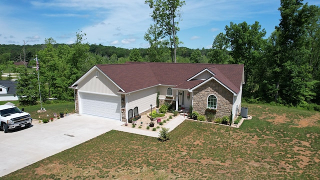 ranch-style house with a garage and a front lawn