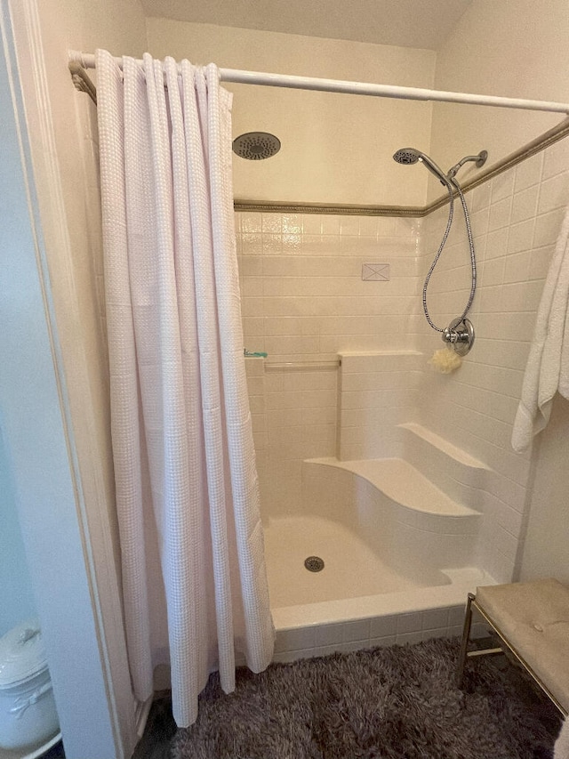 bathroom featuring walk in shower