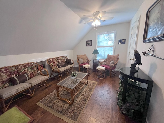 living room with lofted ceiling, dark hardwood / wood-style floors, and ceiling fan