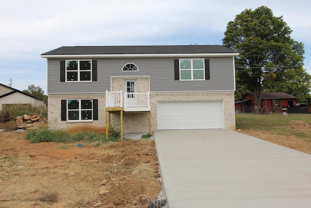 bi-level home featuring a garage