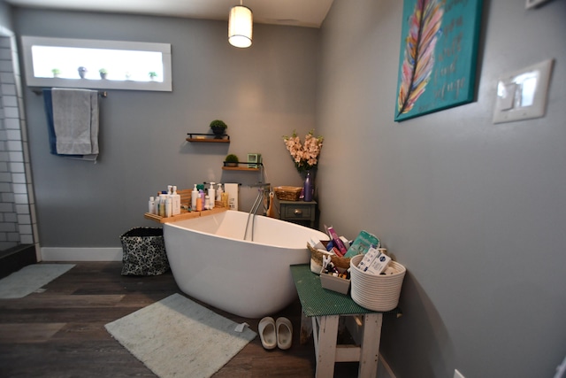 bathroom with hardwood / wood-style flooring