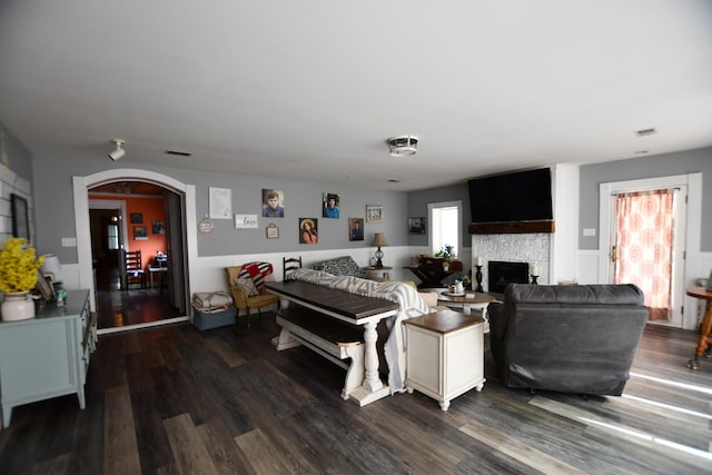 living room featuring dark hardwood / wood-style floors