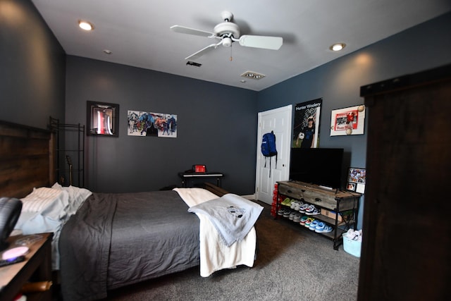 carpeted bedroom featuring ceiling fan