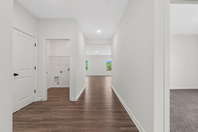 corridor featuring dark hardwood / wood-style floors