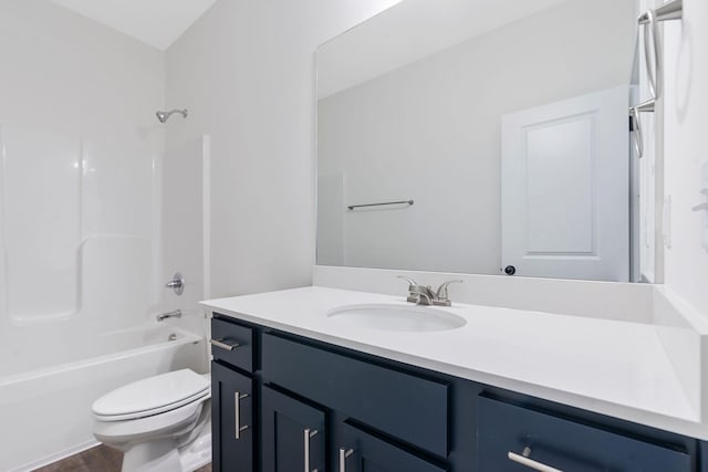 full bathroom with toilet, vanity, and shower / tub combination