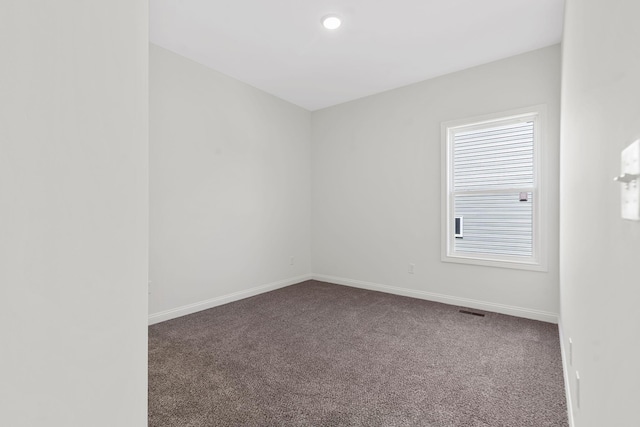 view of carpeted spare room