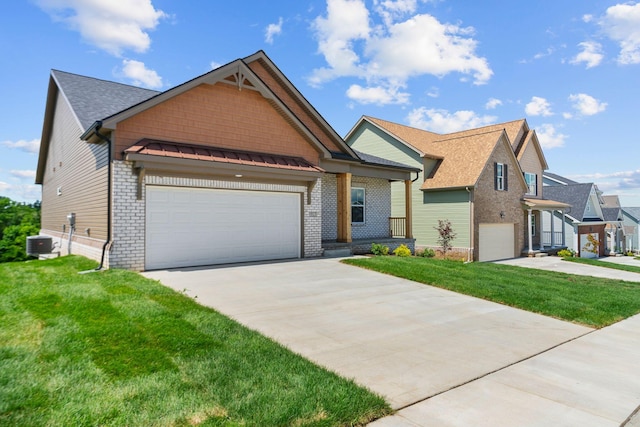 craftsman-style house featuring a front lawn and central AC