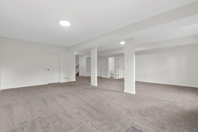 basement featuring carpet flooring