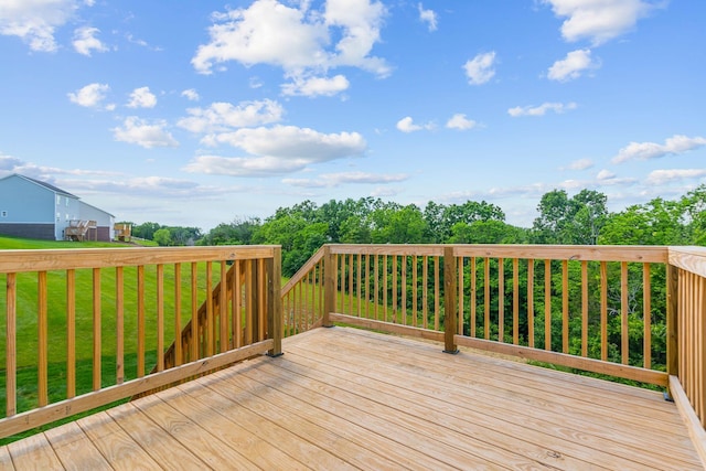 wooden deck with a yard