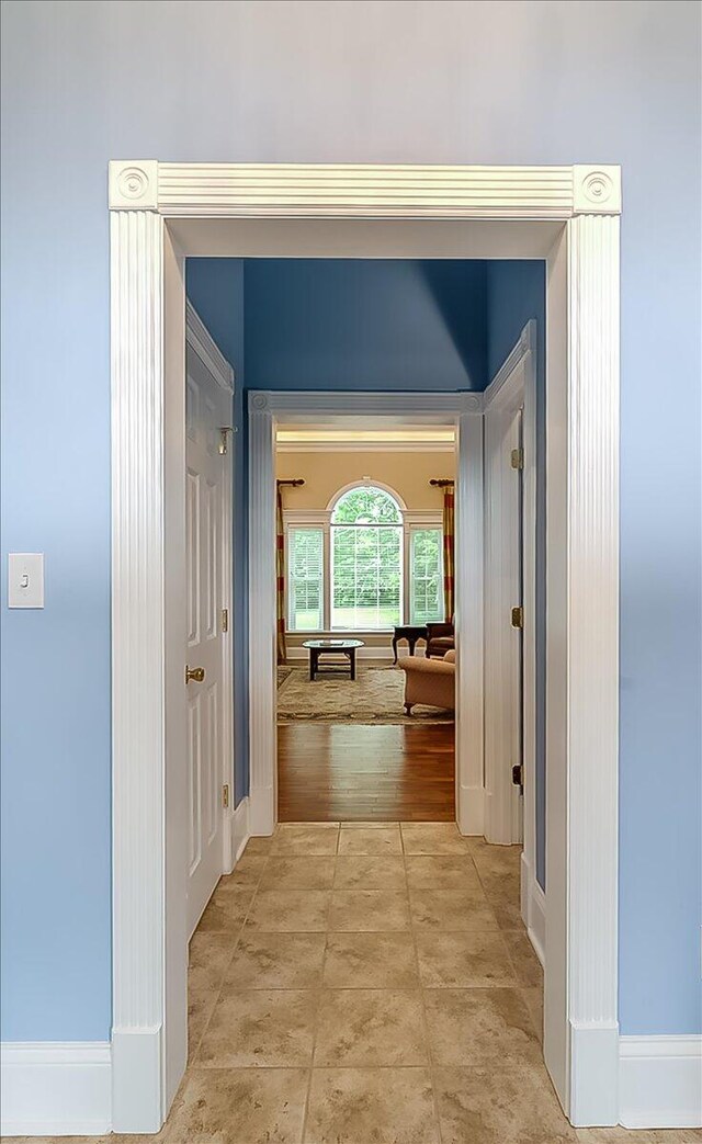 hall with light hardwood / wood-style flooring