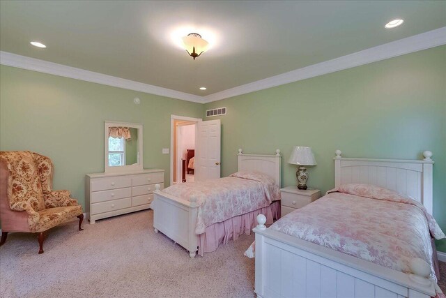 carpeted bedroom with crown molding