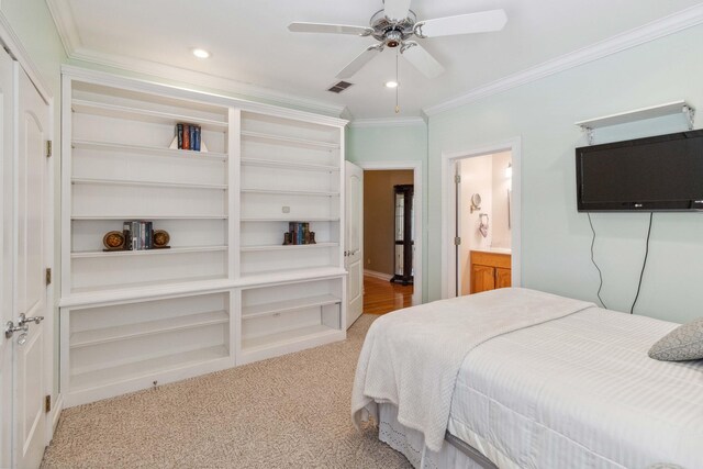 office featuring ceiling fan, a healthy amount of sunlight, light hardwood / wood-style flooring, and crown molding