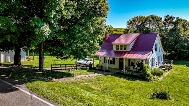 view of front facade with a porch and a front yard