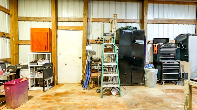 interior space with black refrigerator