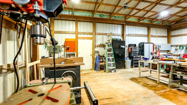 garage with a workshop area