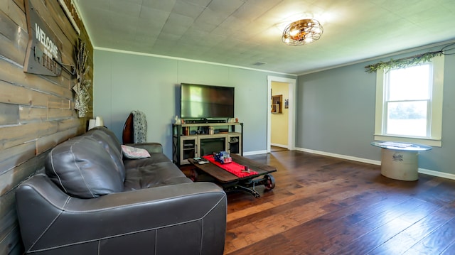 living room with ornamental molding and wood-type flooring