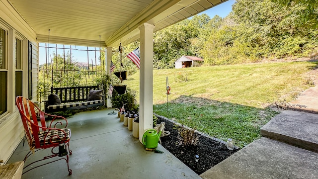 view of patio featuring a porch