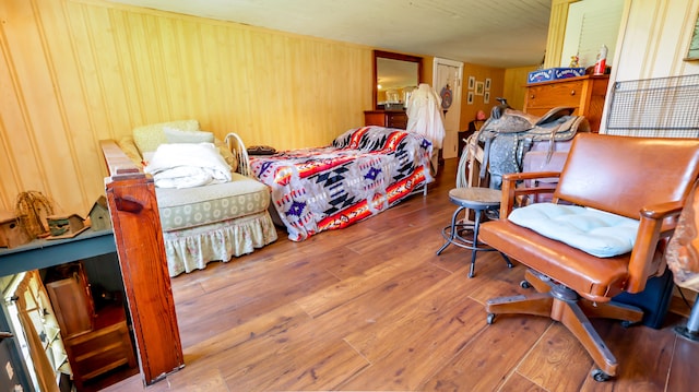 bedroom with hardwood / wood-style flooring