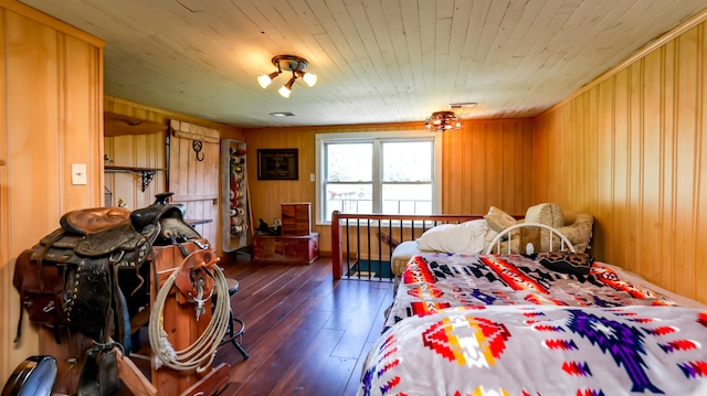 bedroom with wooden walls, wooden ceiling, and wood-type flooring