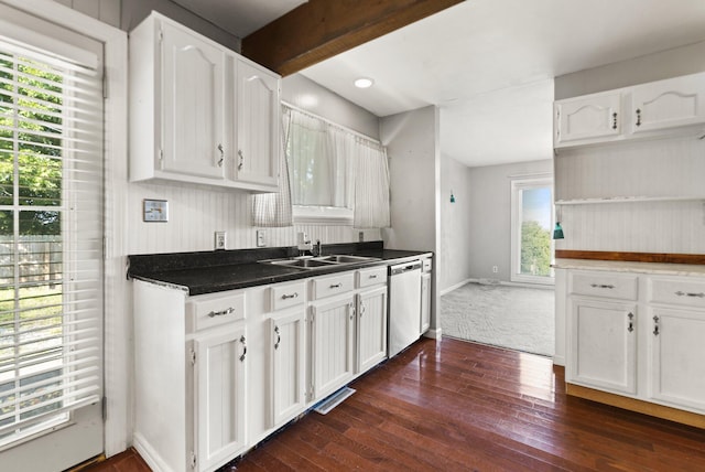 kitchen featuring dishwasher, dark hardwood / wood-style floors, sink, beam ceiling, and white cabinetry