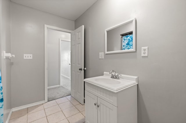 bathroom with vanity and tile patterned floors