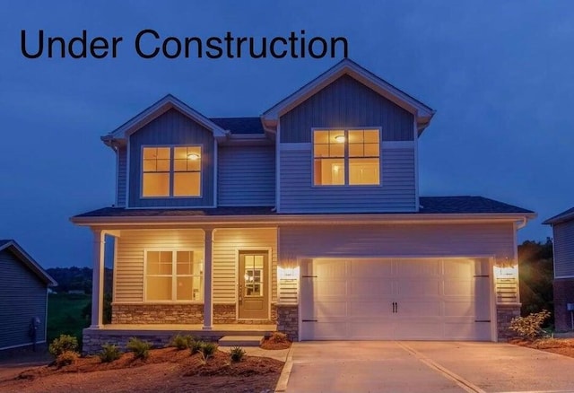 craftsman inspired home with a porch, concrete driveway, board and batten siding, a garage, and stone siding