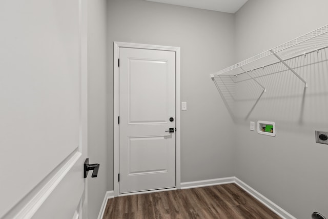 laundry room featuring hookup for a washing machine, hookup for an electric dryer, and dark hardwood / wood-style floors