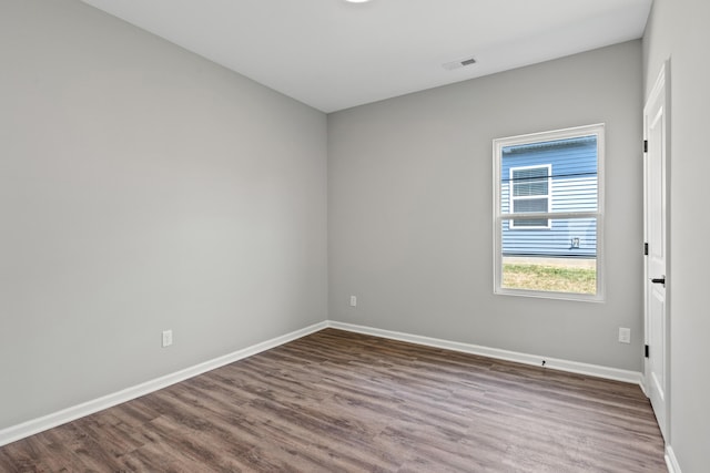 empty room featuring hardwood / wood-style floors