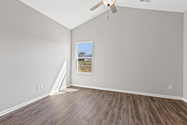 empty room with dark wood-type flooring, ceiling fan, and high vaulted ceiling