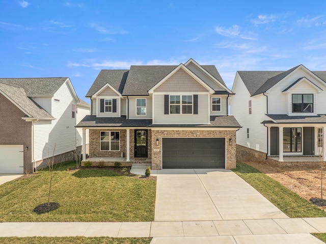 craftsman inspired home featuring a front lawn, covered porch, brick siding, and driveway