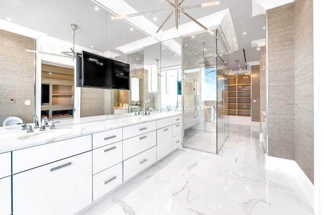 bathroom featuring a shower with door, tile flooring, and dual bowl vanity