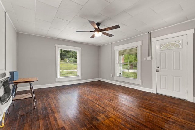 entrance foyer with ceiling fan and wood-type flooring