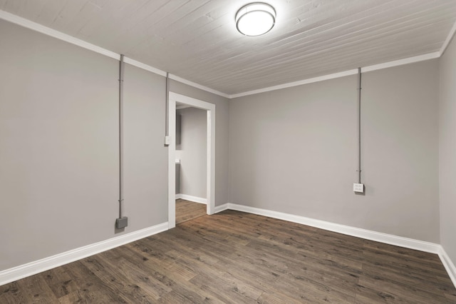 empty room featuring crown molding and hardwood / wood-style floors