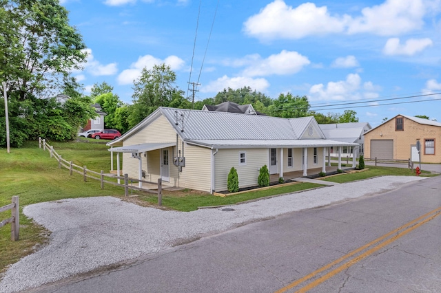 view of front facade with a garage and a front yard