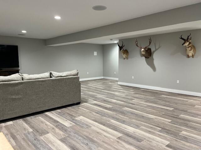 unfurnished living room featuring light hardwood / wood-style floors