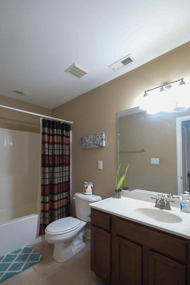 full bathroom with tile patterned floors, vanity, shower / tub combo, and toilet