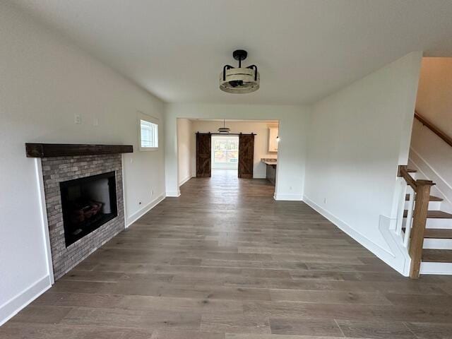 hall with dark hardwood / wood-style flooring