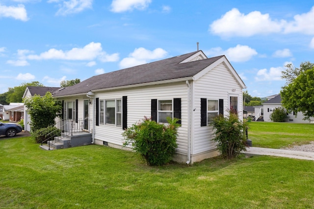 view of home's exterior featuring a lawn