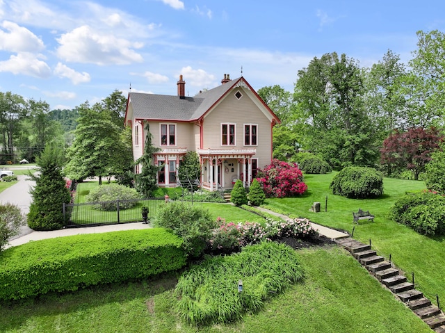 1023 Riverside Dr, Greenup, KY 41144 - rear view of house with a chimney