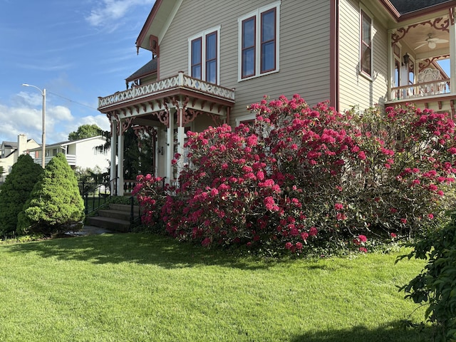1023 Riverside Dr, Greenup, KY 41144 - view of property exterior featuring a yard and a balcony