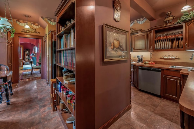 1023 Riverside Dr, Greenup, KY 41144 - kitchen featuring stainless steel dishwasher, open shelves, a sink, arched walkways, and hanging light fixtures