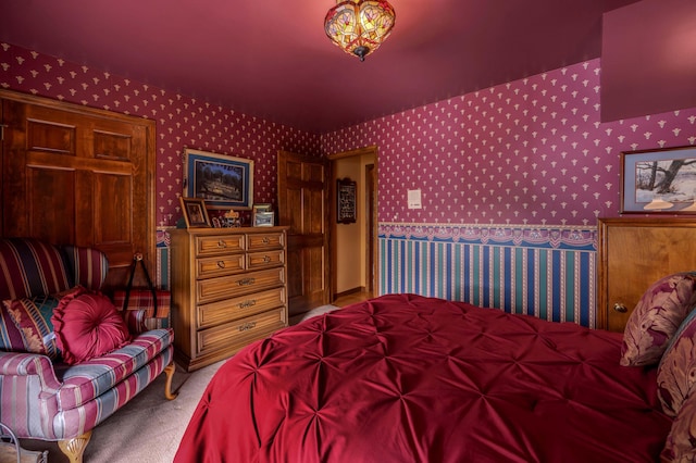 1023 Riverside Dr, Greenup, KY 41144 - bedroom with wallpapered walls and carpet flooring