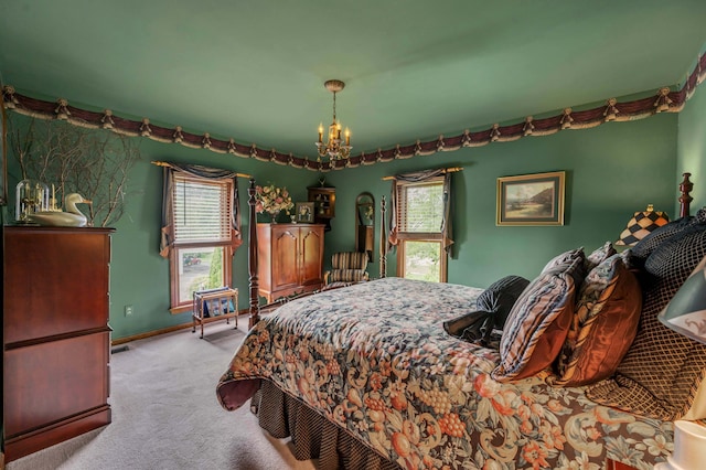 1023 Riverside Dr, Greenup, KY 41144 - carpeted bedroom featuring a chandelier and baseboards